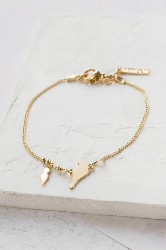 Minimalist baby bird charm bracelet