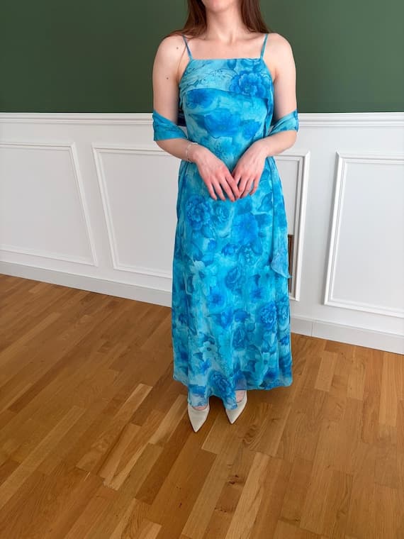 Blue floral chiffon maxi dress with draped cape sleeves